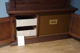 Locally Amish Custom Made Gun Cabinet Safe Close up of Bottom with Color Correcting Block